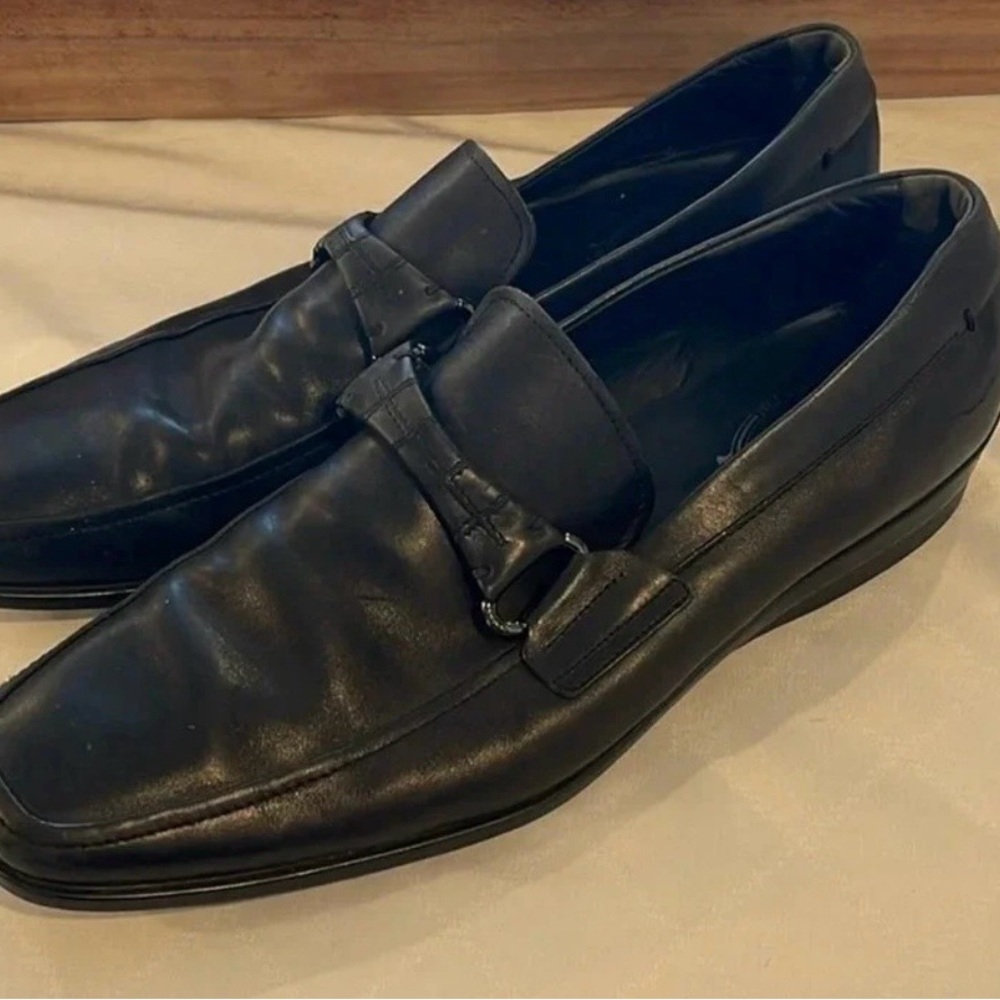 Tod's Black Leather Slip-On Loafers with Bit Detail